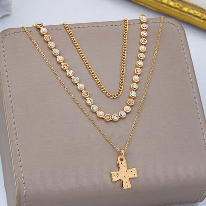 Brandt Multi-Layered Cross Pendant Necklace
