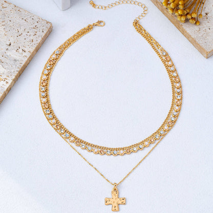 Brandt Multi-Layered Cross Pendant Necklace