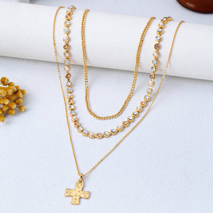 Brandt Multi-Layered Cross Pendant Necklace