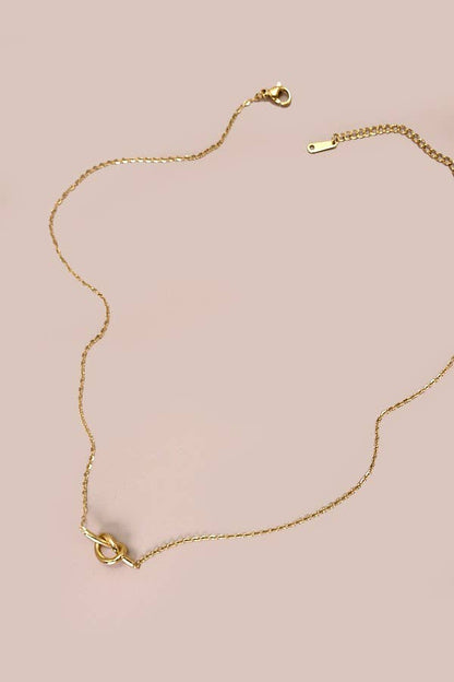 AMELIE TITANIUM STEEL NON-TARNISH KNOTTED NECKLACE - Whimsical Details - ["cross necklace","gold","knot","necklace"]