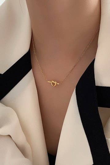 AMELIE TITANIUM STEEL NON-TARNISH KNOTTED NECKLACE - Whimsical Details - ["cross necklace","gold","knot","necklace"]